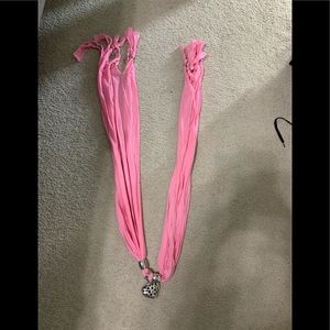Pink scarf with silver heart pendant